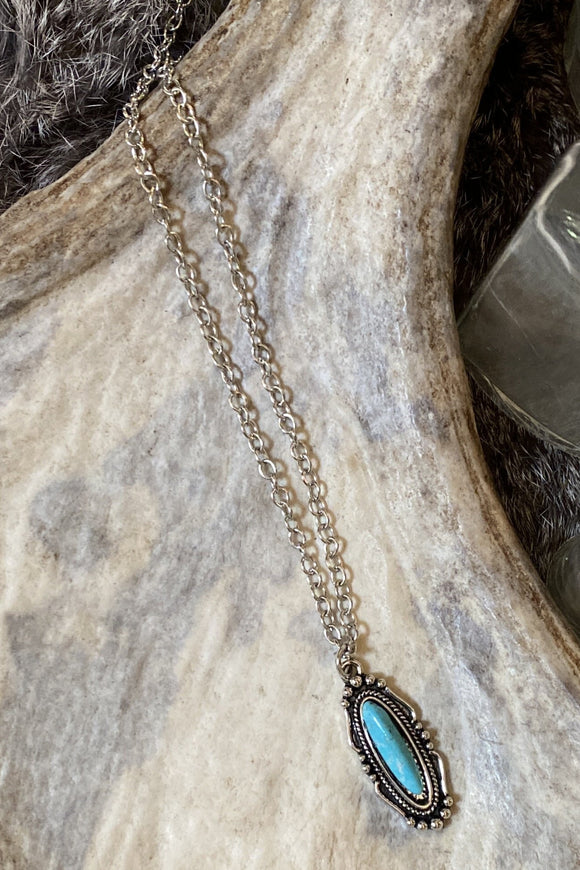 Elongated Turquoise Pendant on Silver Chain